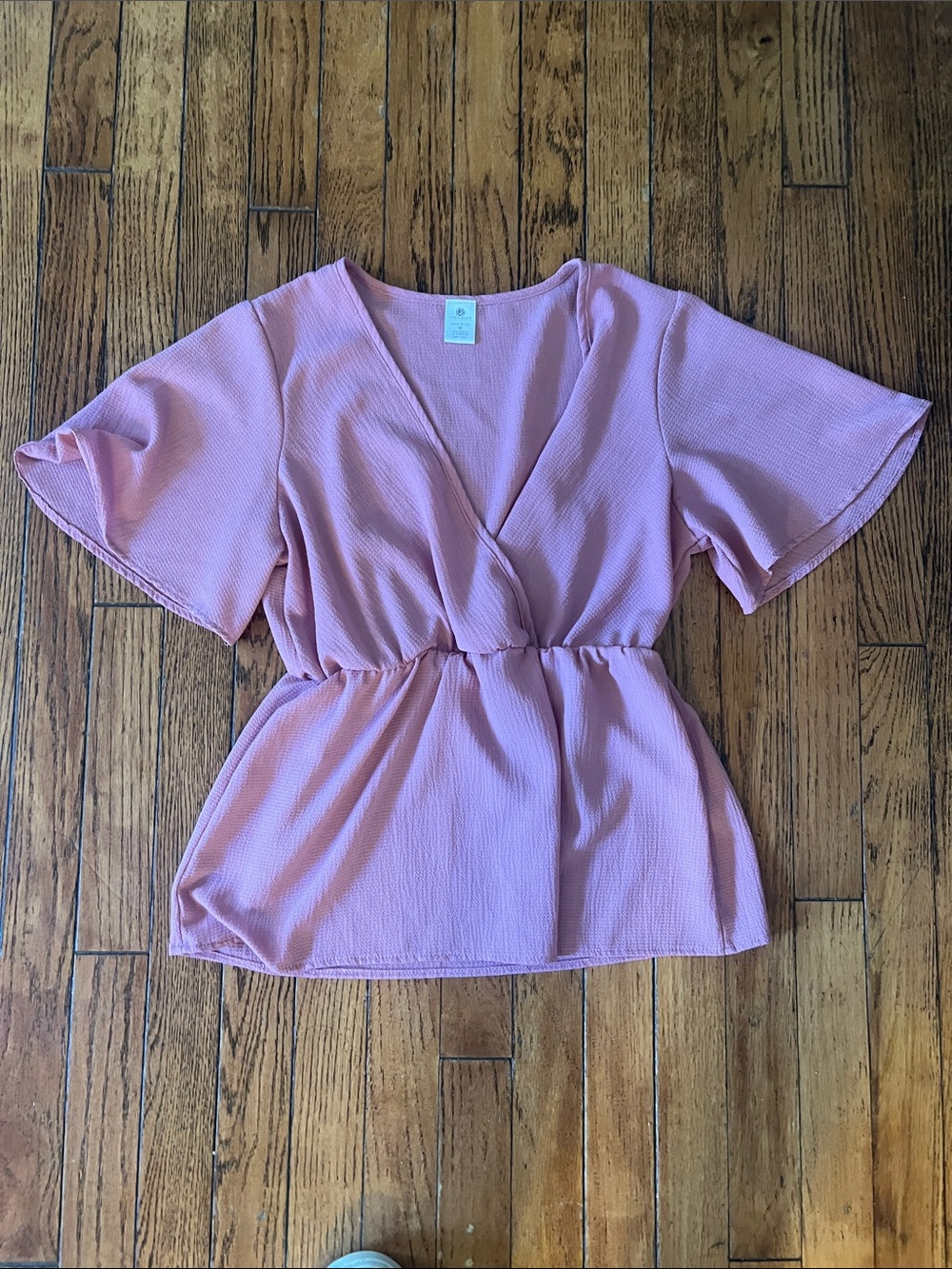 Blush Pink V-Neck Peplum Blouse with Flutter Sleeves